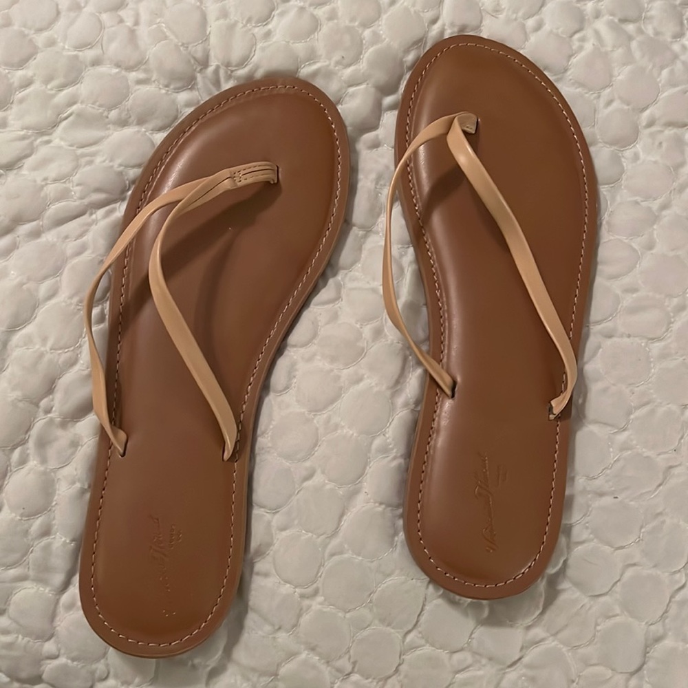 Sandals never worn. Not my size